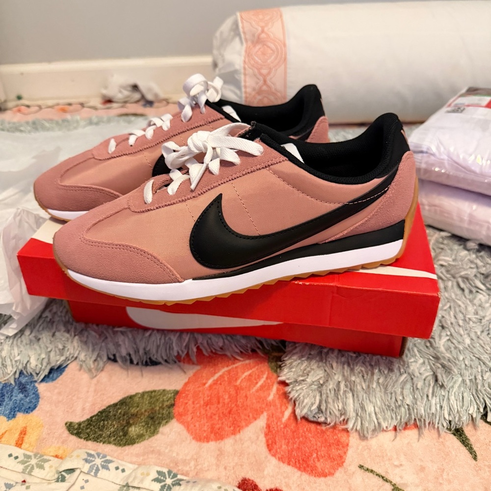 Nike Women's Dusty Pink Sneakers with Black Swoosh